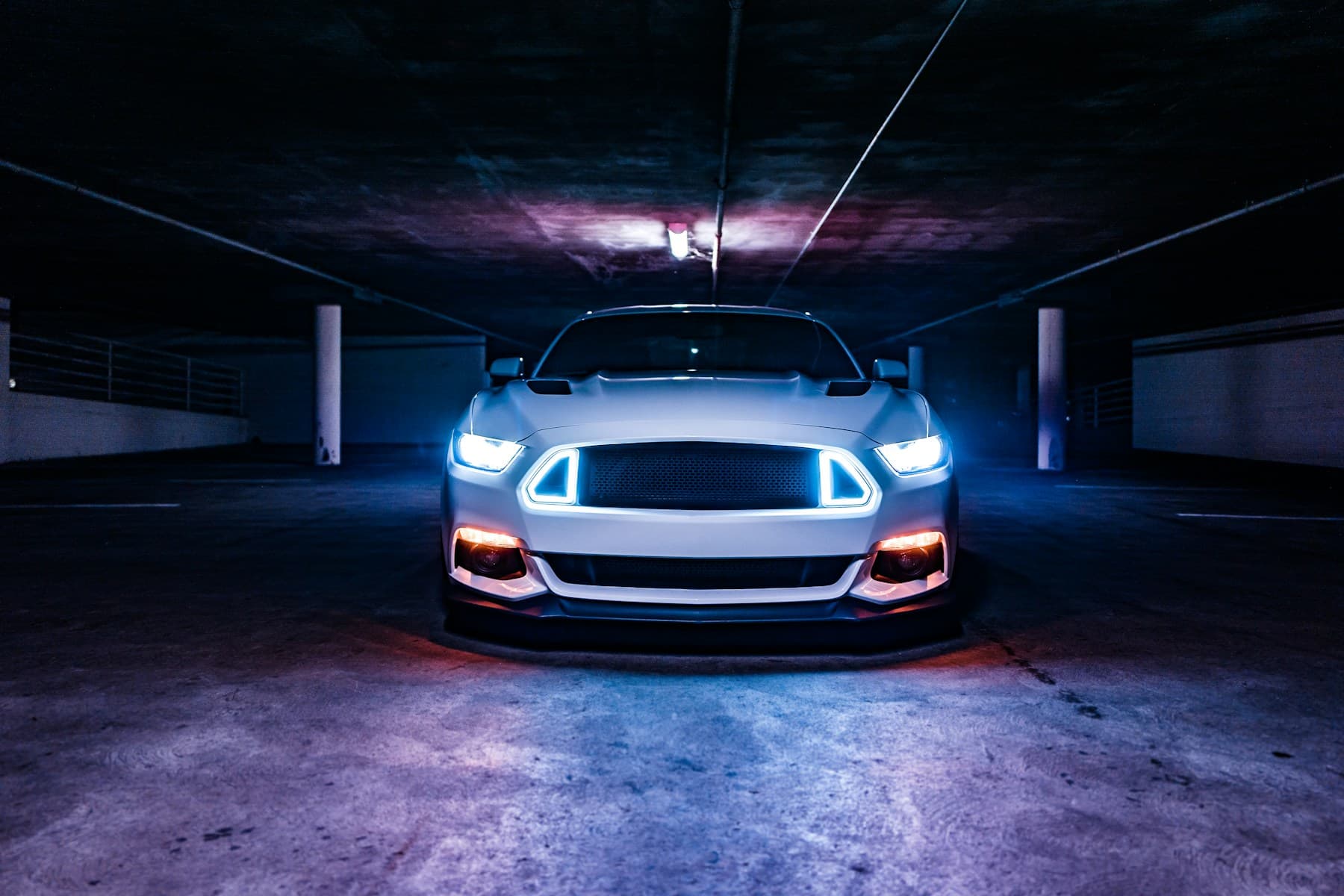 Private vehicle in a discreet garage setting for security and privacy planning